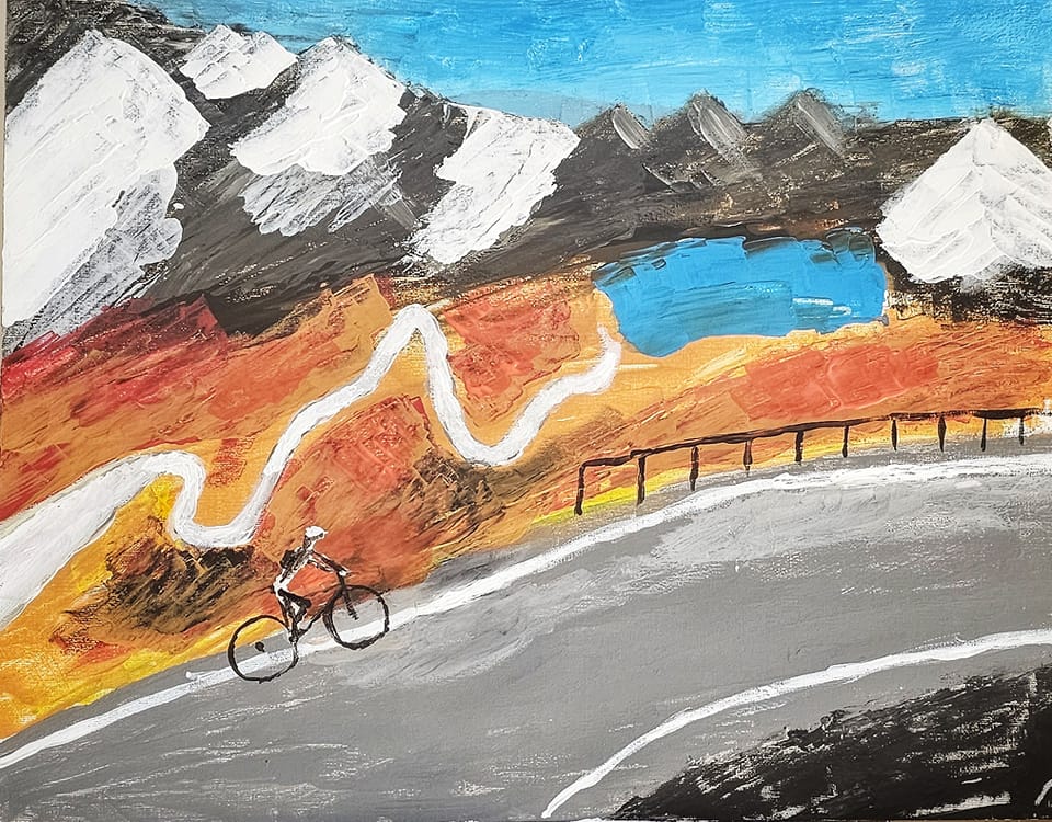Cyclist on the mountain pass - paradise